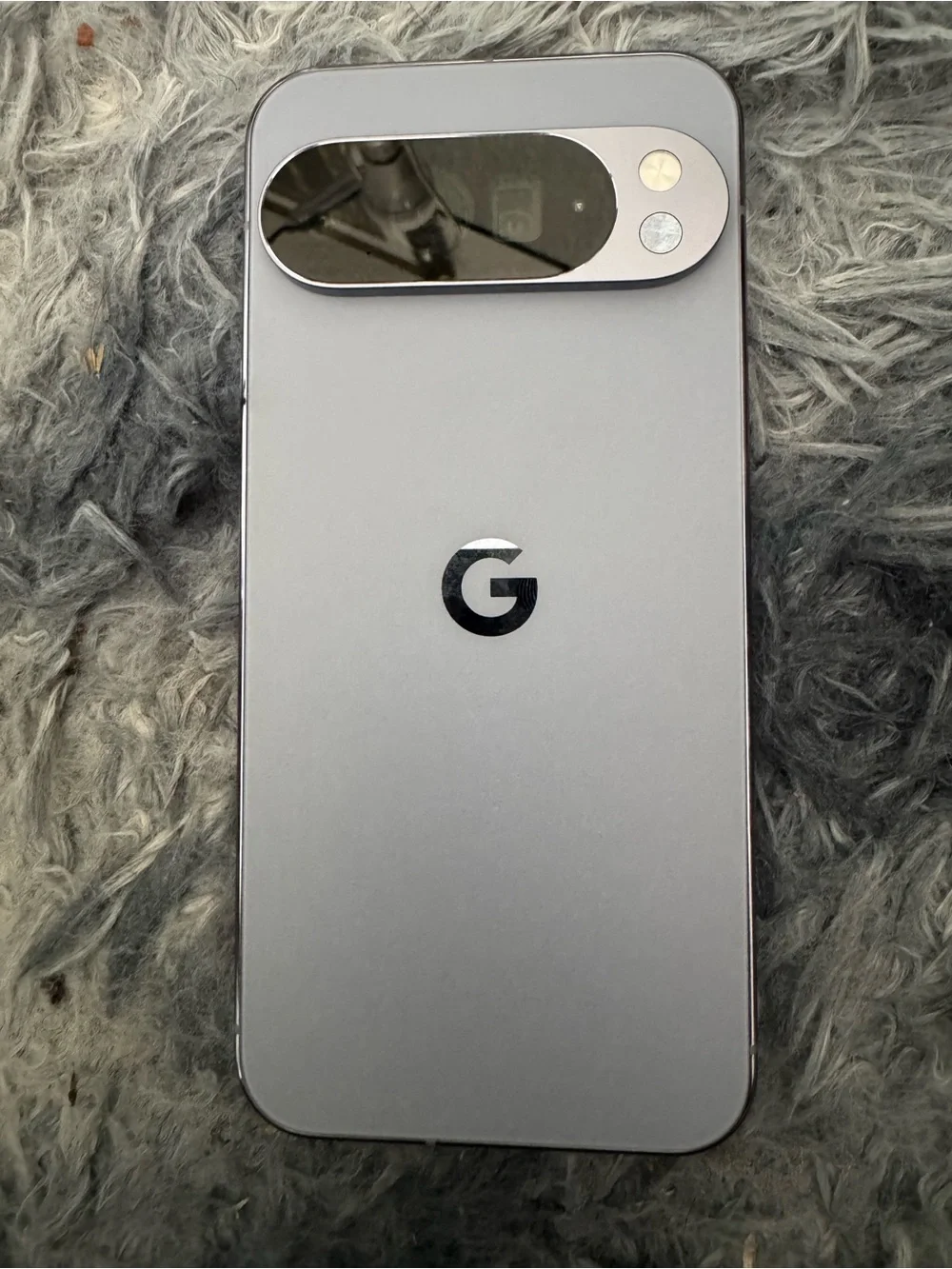 Matte Gray Cell Phone with Subtle Circular Logo - Sleek Modern Finish